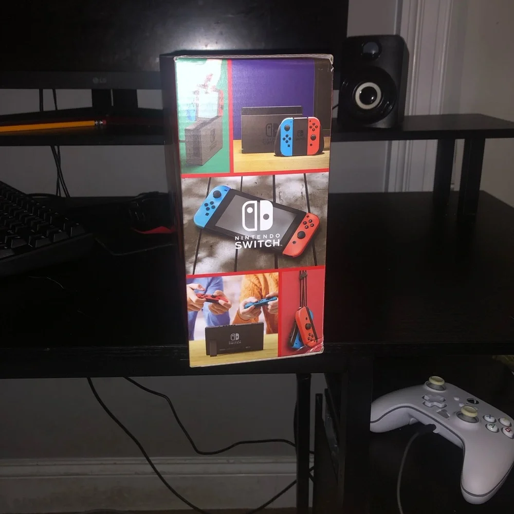 Nintendo Switch Console with Vibrant Blue and Orange Joy-Con